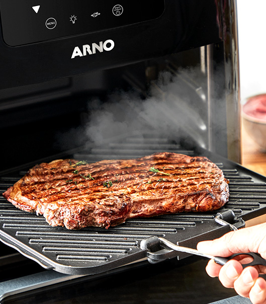 Exclusiva função grill. Faça seu churrasco em casa, grelhados suculentos e saborosos, até com a marquinha da grelha. 