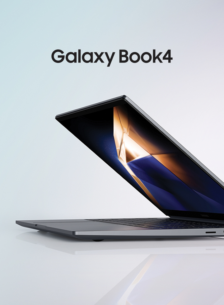 O Galaxy Book4 cinza está aberto até a metade, voltado para a esquerda com um papel de parede verde-escuro e amarelo na tela.